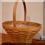 D76. Longaberger Basket with handle and plastic insert. - $22